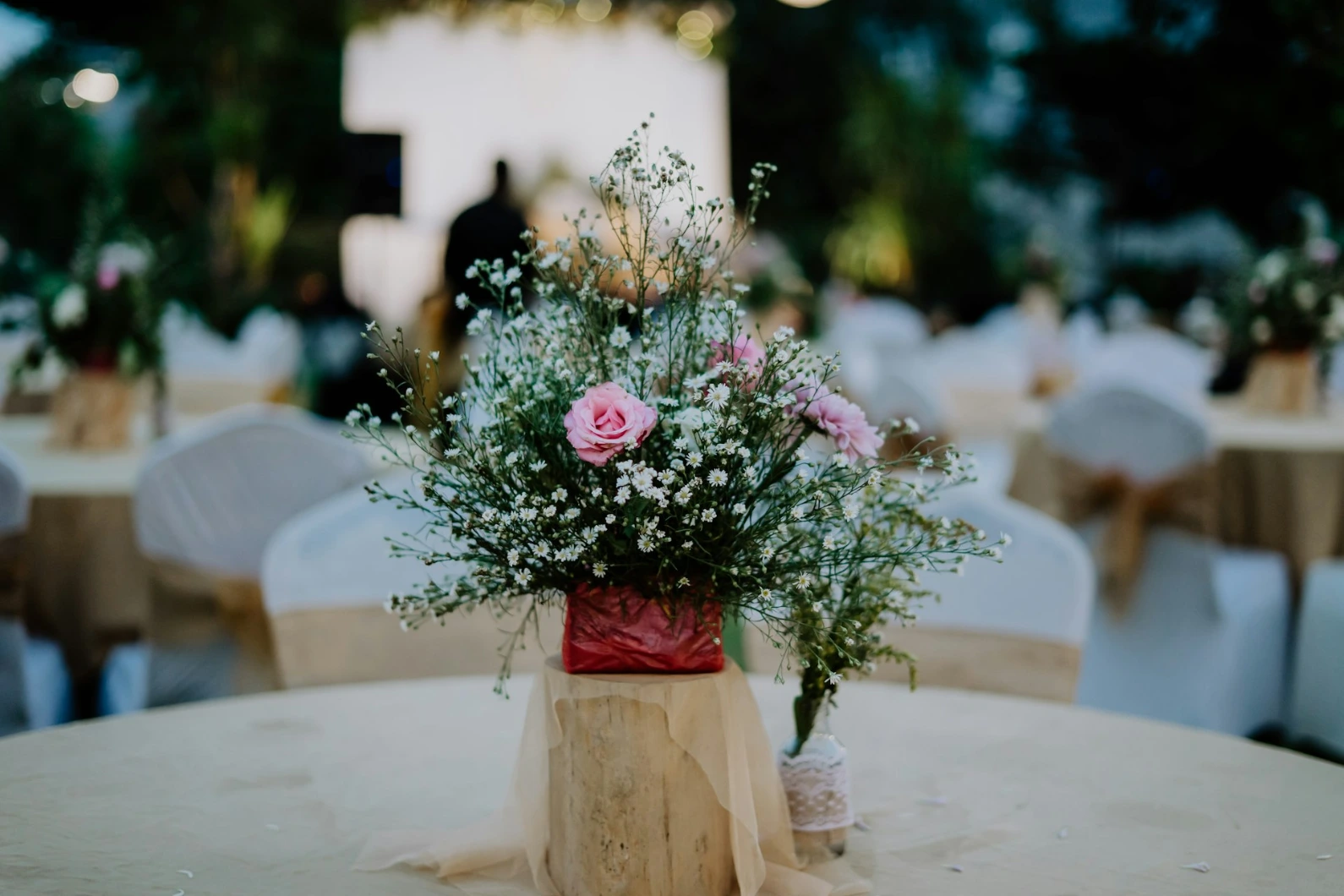 a vase of flowers sitting on top of a table